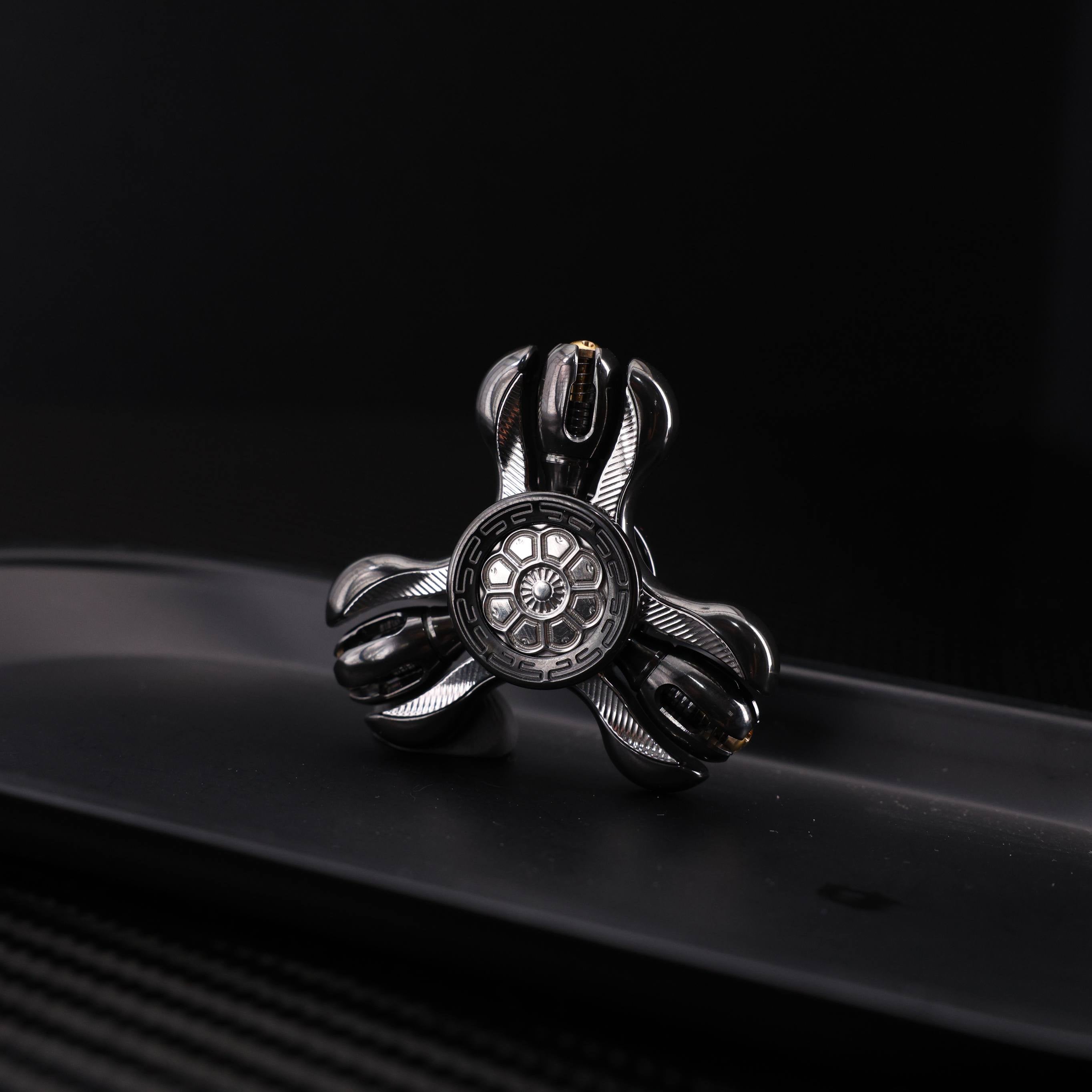 "Jinglun", a fingertip gyroscope with a polished zirconium alloy and stainless steel patch version by CHIMAGO EDC