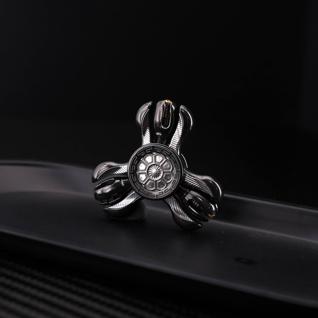 "Jinglun", a fingertip gyroscope with a polished zirconium alloy and stainless steel patch version by CHIMAGO EDC