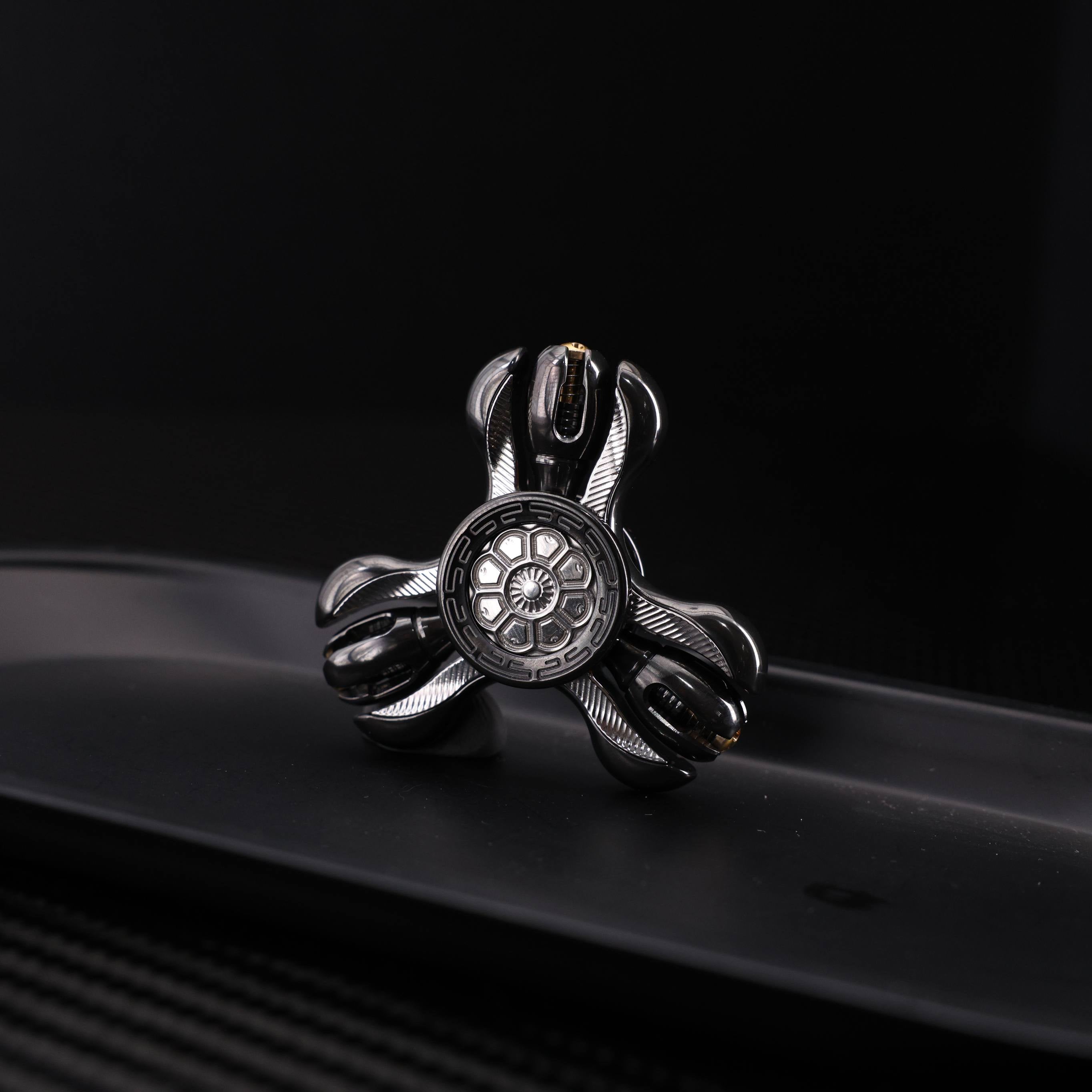"Jinglun", a fingertip gyroscope with a polished zirconium alloy and stainless steel patch version by CHIMAGO EDC