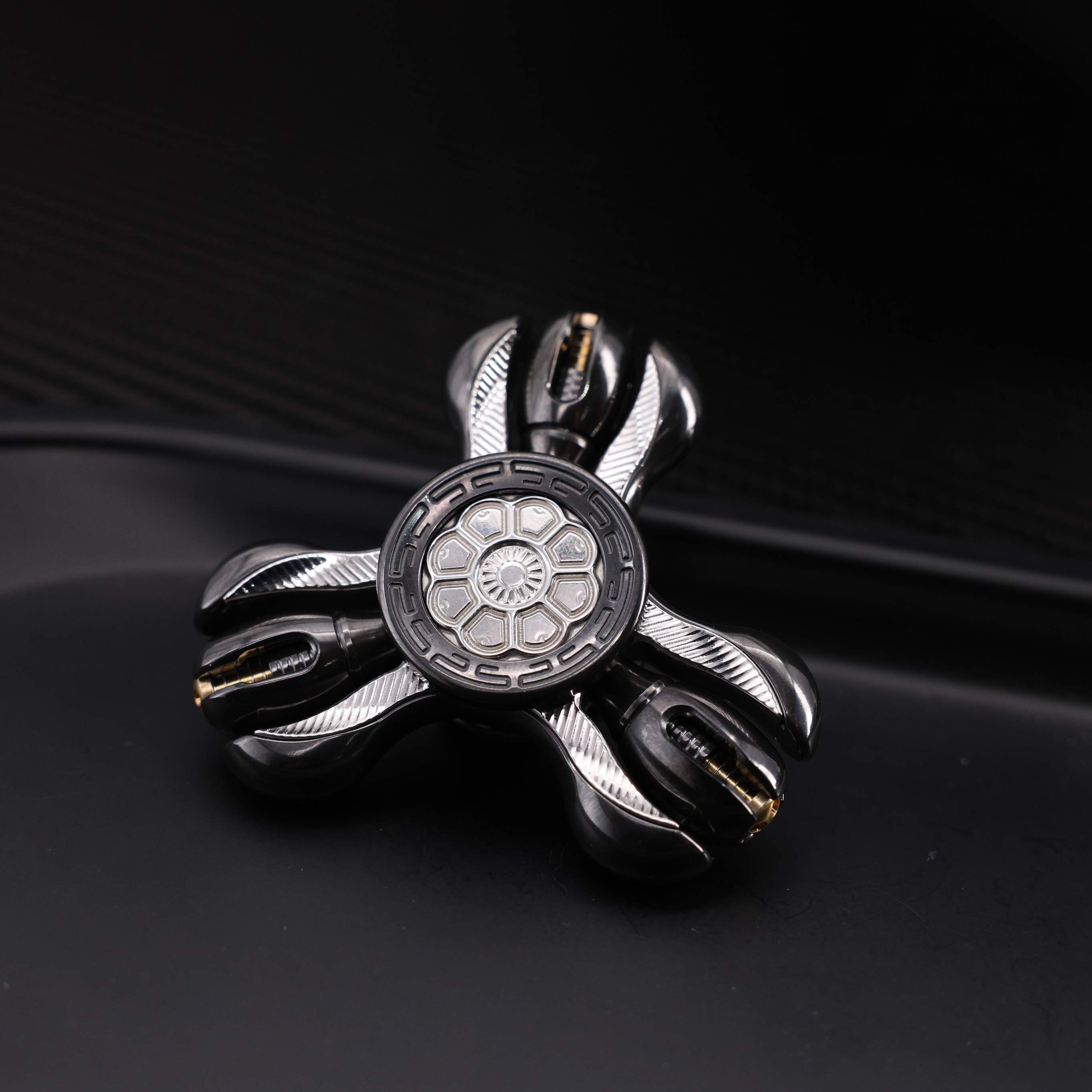 "Jinglun", a fingertip gyroscope with a polished zirconium alloy and stainless steel patch version by CHIMAGO EDC