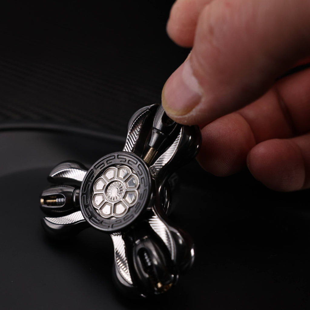 "Jinglun", a fingertip gyroscope with a polished zirconium alloy and stainless steel patch version by CHIMAGO EDC
