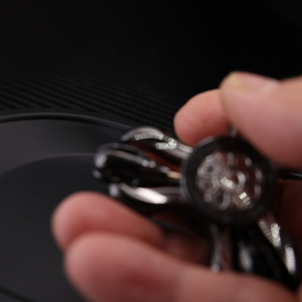 "Jinglun", a fingertip gyroscope with a polished zirconium alloy and stainless steel patch version by CHIMAGO EDC