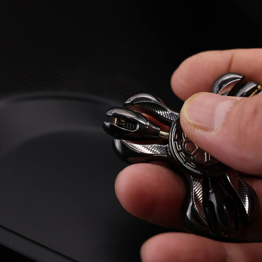 "Jinglun", a fingertip gyroscope with a polished zirconium alloy and stainless steel patch version by CHIMAGO EDC
