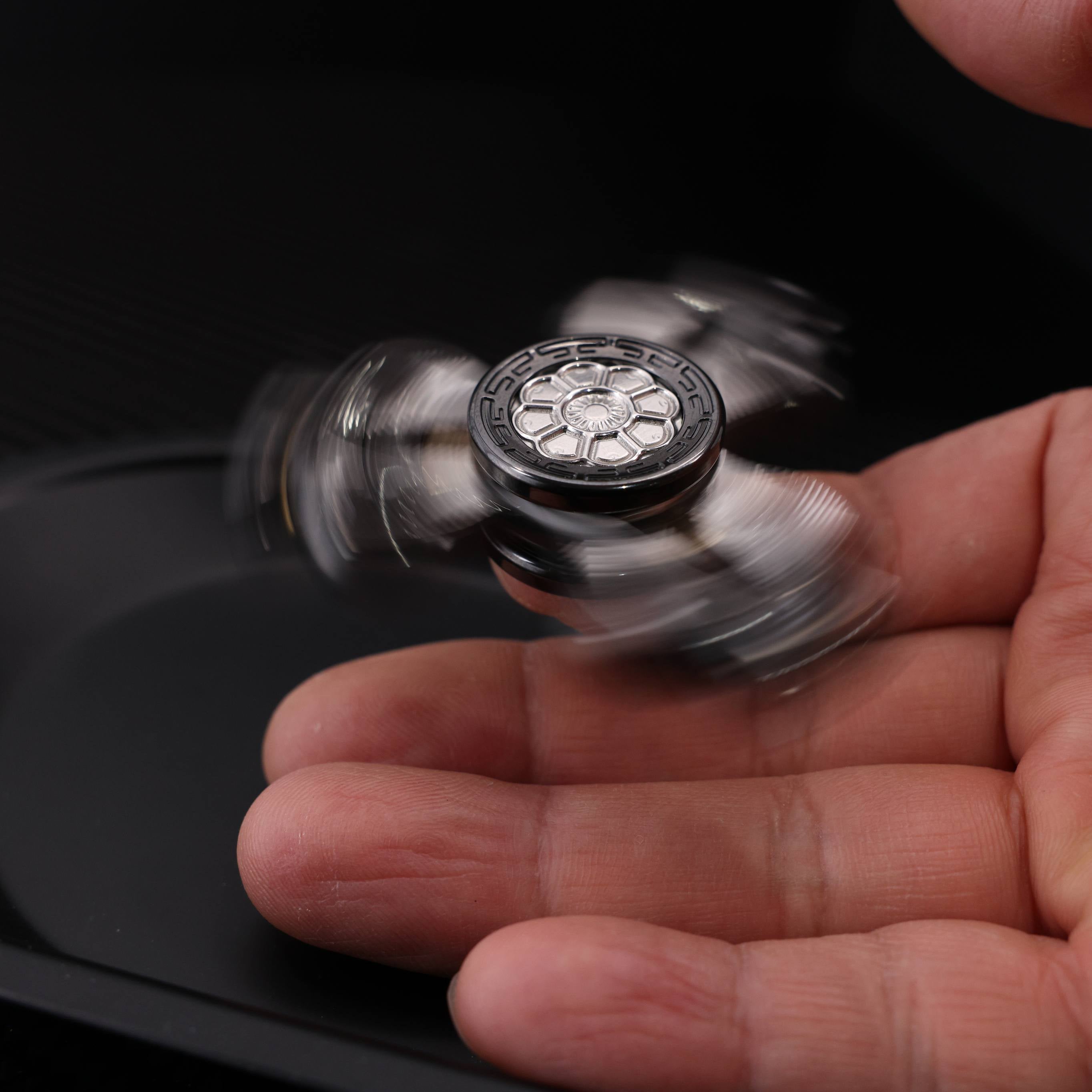 "Jinglun", a fingertip gyroscope with a polished zirconium alloy and stainless steel patch version by CHIMAGO EDC