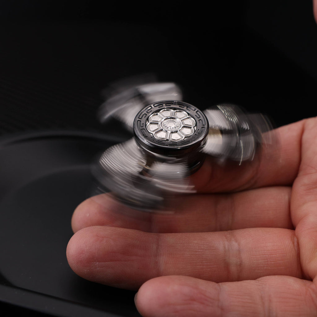 "Jinglun", a fingertip gyroscope with a polished zirconium alloy and stainless steel patch version by CHIMAGO EDC